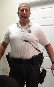 Sergeant Paul Spriggs pauses a moment while suiting up for duty.