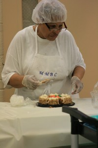 Deaconess Sarah Lynch preparing the afternoon's desert.