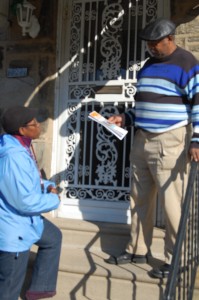 Margaret Shepherd gives passes out delinquency information to residents of West Oak Lane